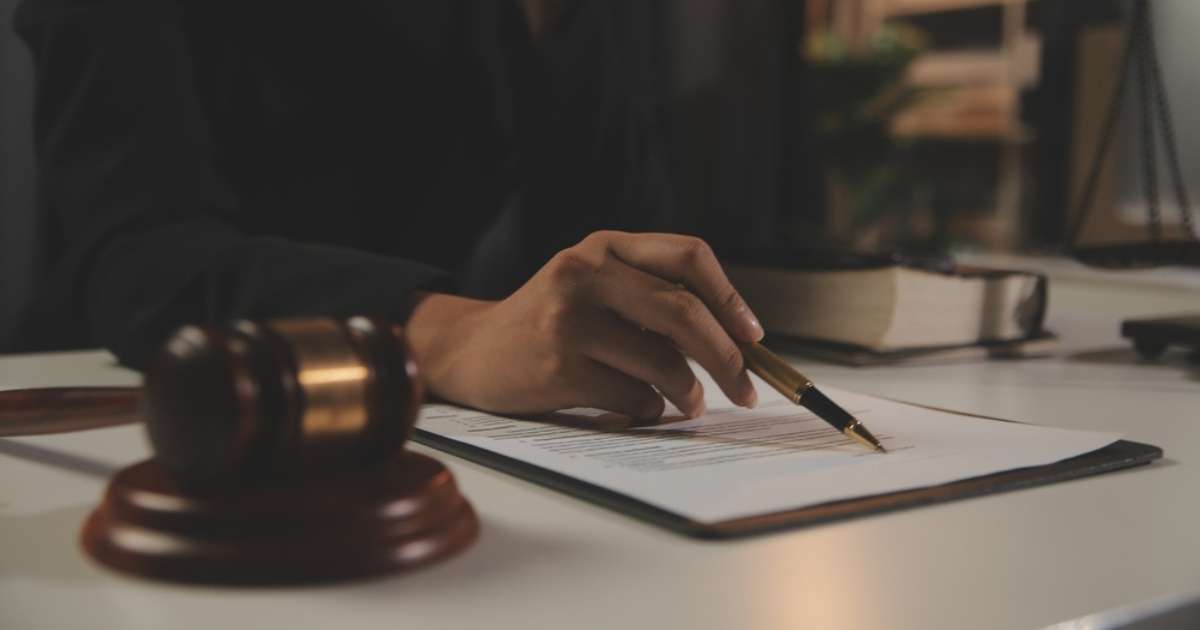 A Delaware divorce lawyer reviewing paperwork