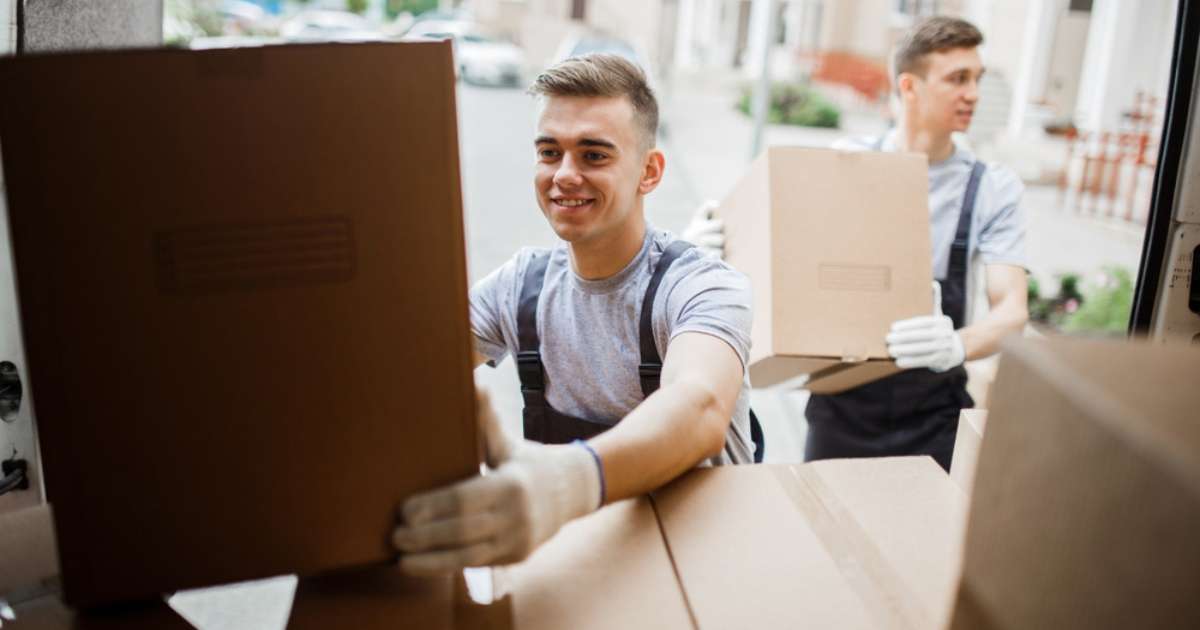 Two-Georgetown-furniture-movers-handling-boxes
