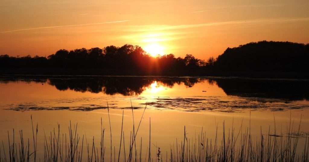 Sunset over a pond in Kent County near Riverview, Delaware